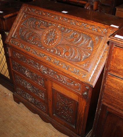 Victorian oak carved bureau(-)